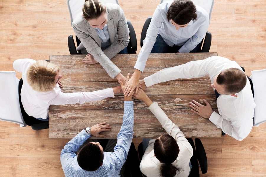 Close up of Business Team with Hands on Top